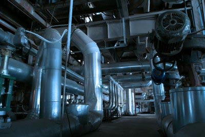 Power Plant interior with tubes and turbines